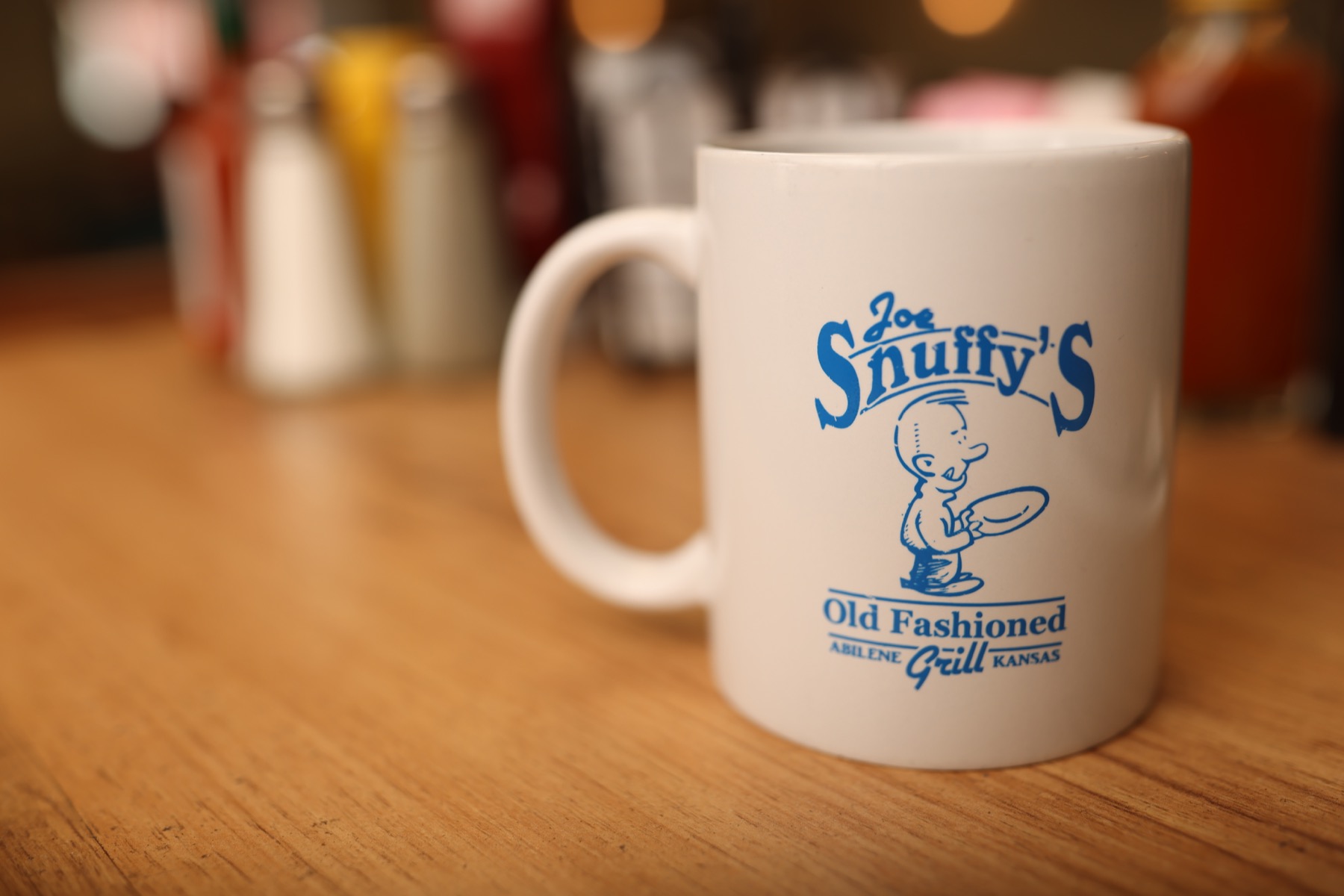 Large Joe Snuffy's drink cup on a diner table