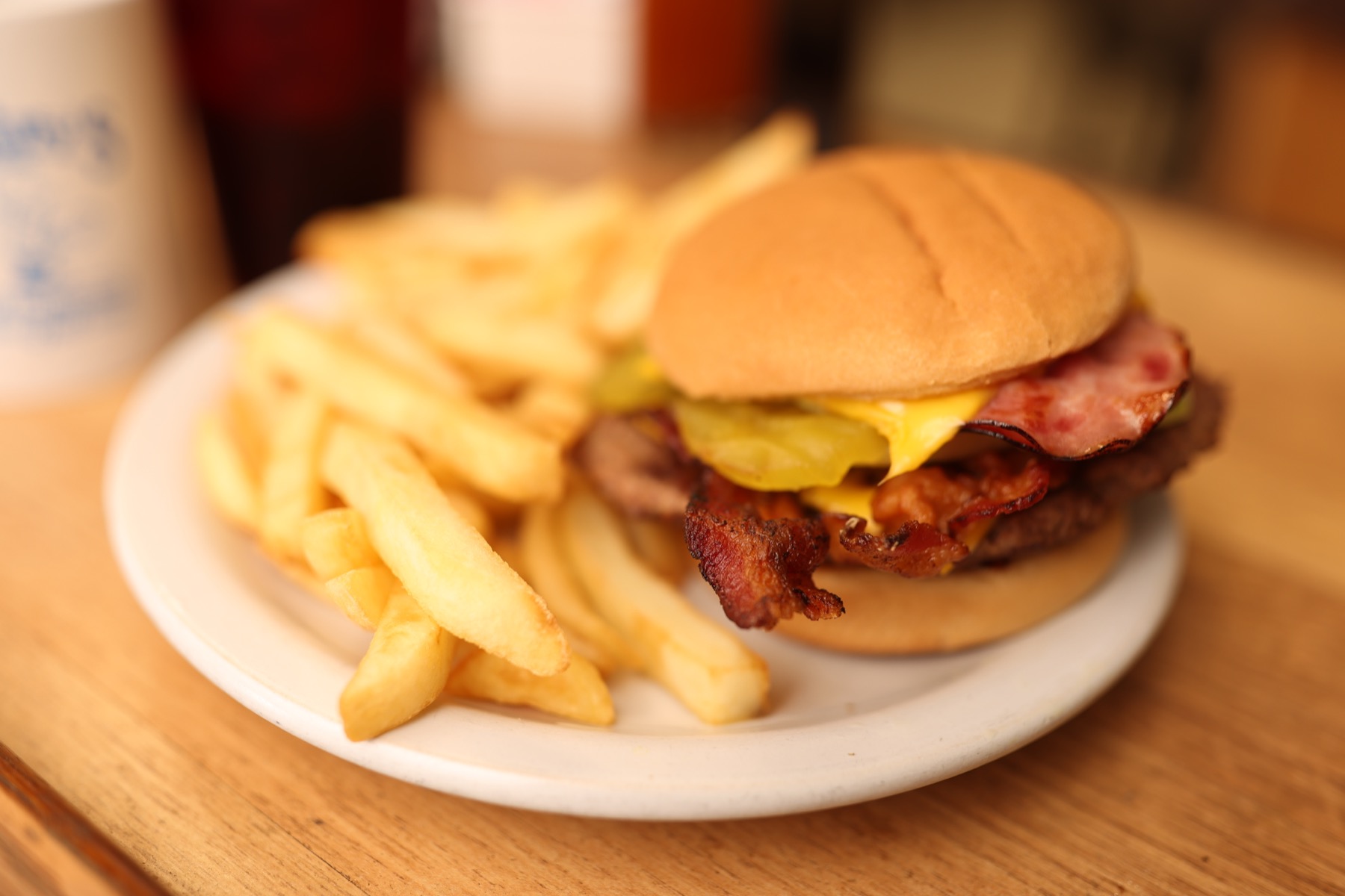 Bacon cheeseburger and fries served at Joe Snuffy's